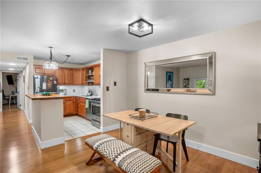 1706 Kenzie Road Pittsburgh, PA 15205 - Photo 7 of 25 a view of a dining room with furniture