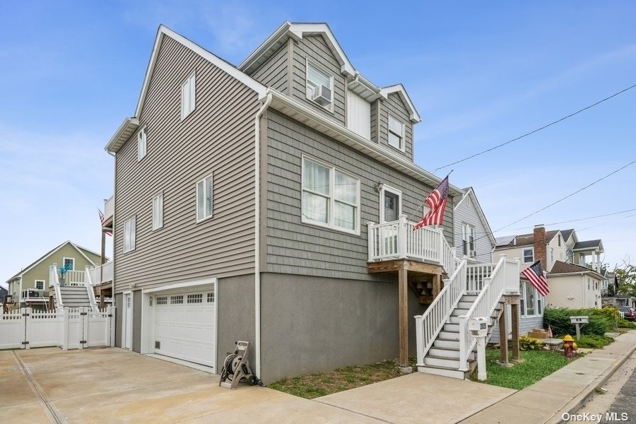 2825 Alder Road Bellmore, NY 11710 - Photo 1 of 1 a view of a house with a garage
