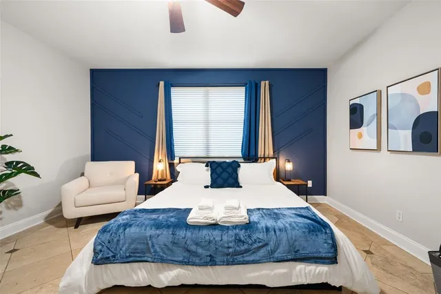a bathroom with a sink vanity and a mirror