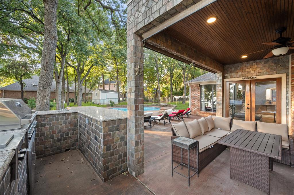 424 Windjammer Lane Azle, TX 76020 - Photo 26 of 37 View of patio / terrace featuring an outdoor living space, a ceiling fan, french doors, and a grill