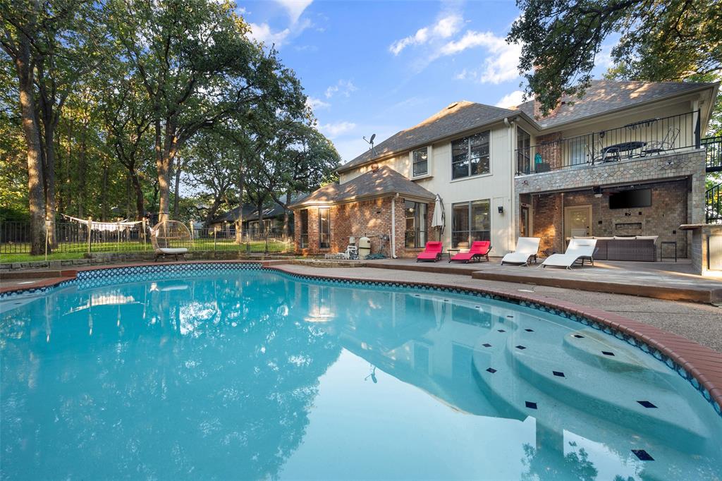 424 Windjammer Lane Azle, TX 76020 - Photo 27 of 37 View of pool with a balcony and a patio