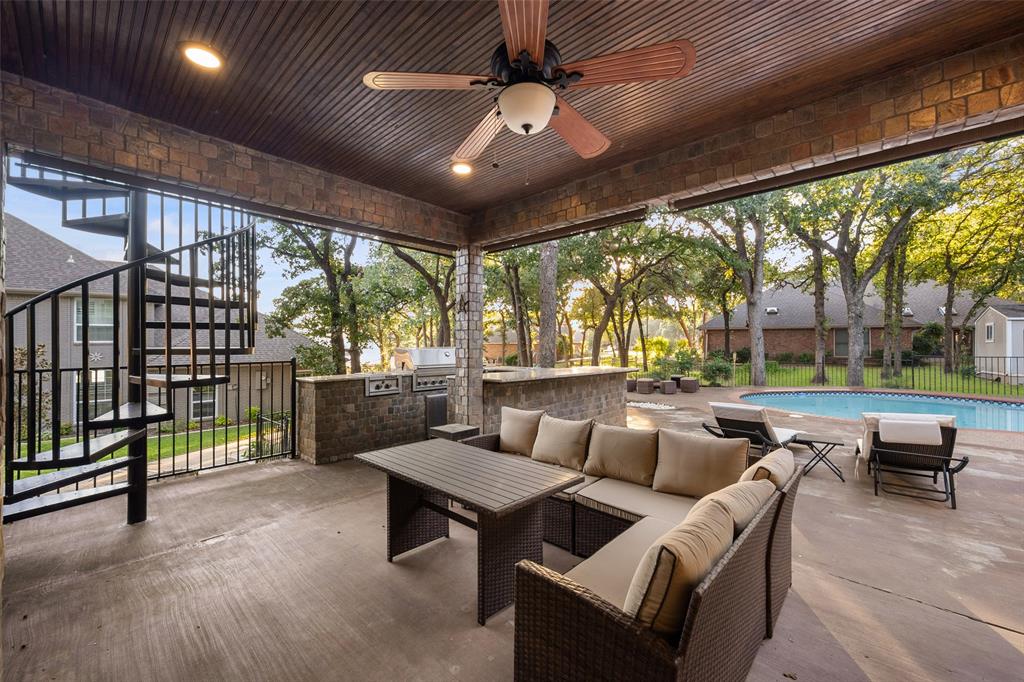 424 Windjammer Lane Azle, TX 76020 - Photo 3 of 37 View of patio with area for grilling, stairway, an outdoor hangout area, and ceiling fan