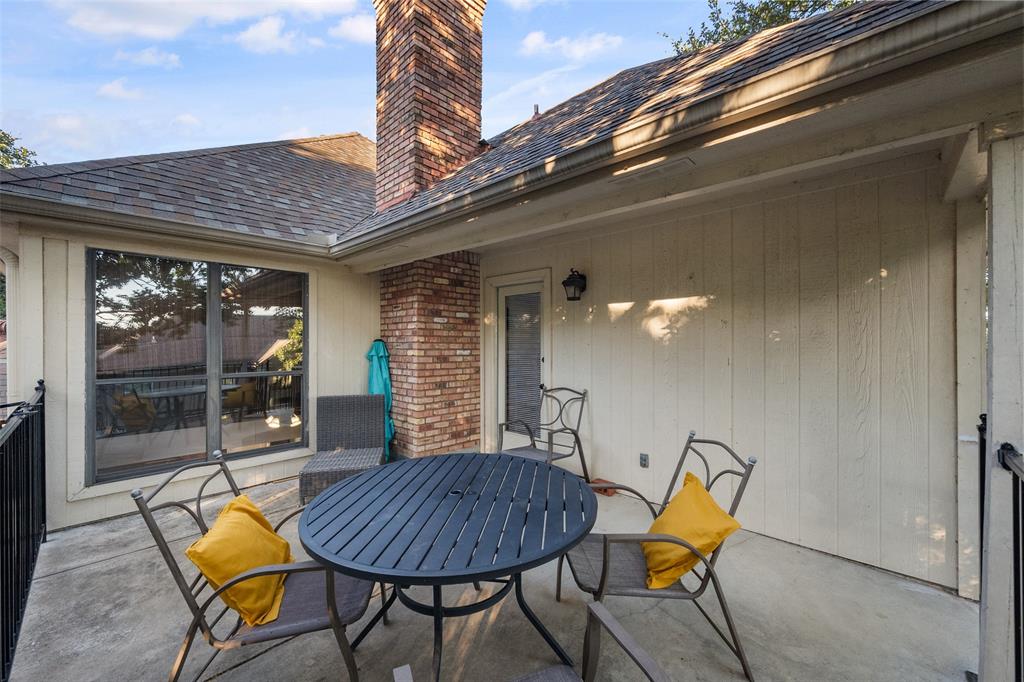 424 Windjammer Lane Azle, TX 76020 - Photo 30 of 37 View of patio featuring outdoor dining area