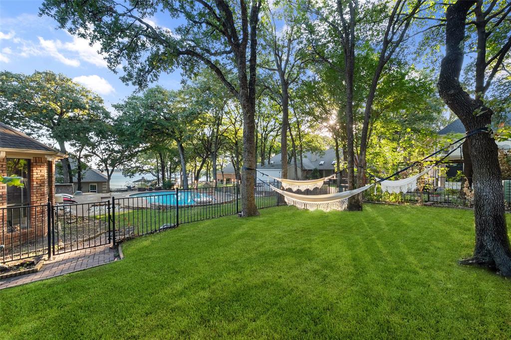 424 Windjammer Lane Azle, TX 76020 - Photo 35 of 37 View of yard with a patio area