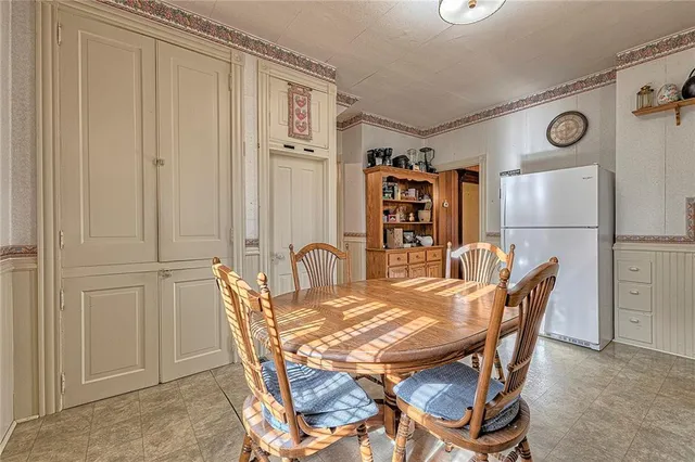 a view of a dining room with furniture