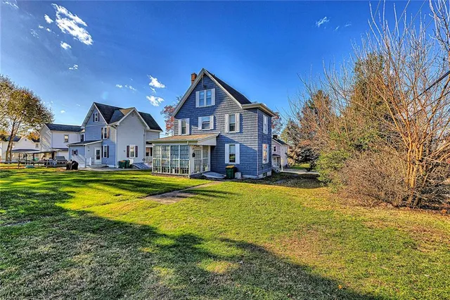 a view of a house with swimming pool