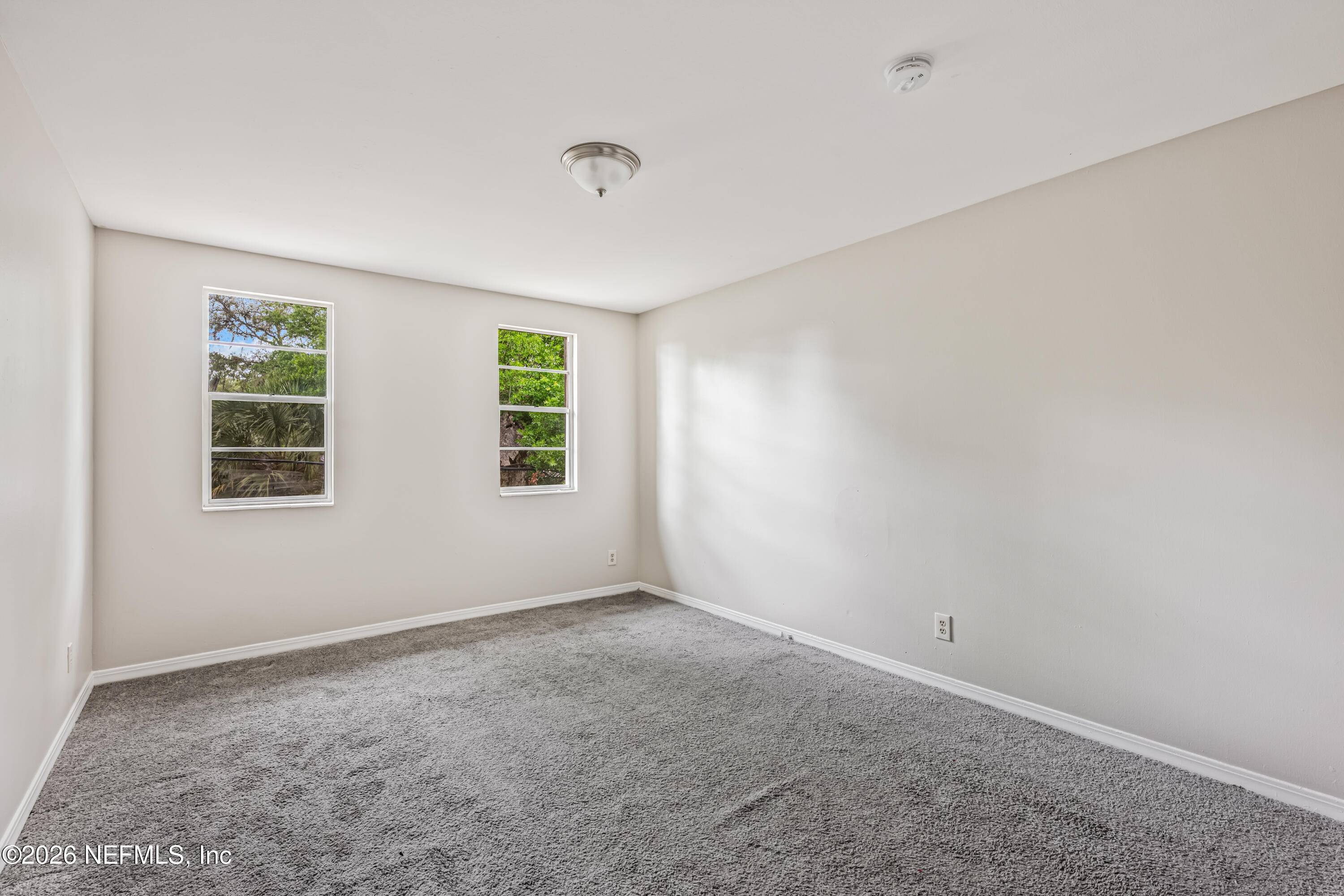 1716 El Camino Road, Unit 6 Jacksonville, FL 32216 - Photo 14 of 18 an empty room with windows