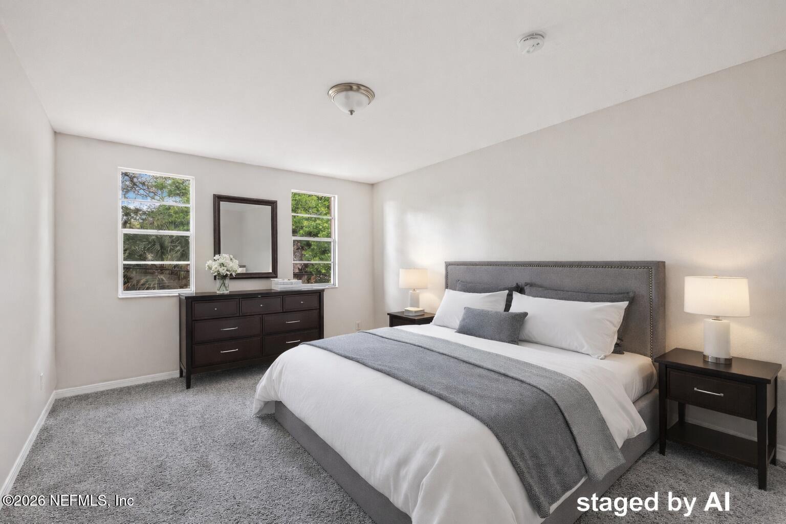 1716 El Camino Road, Unit 6 Jacksonville, FL 32216 - Photo 15 of 18 a bedroom with a bed and a dresser