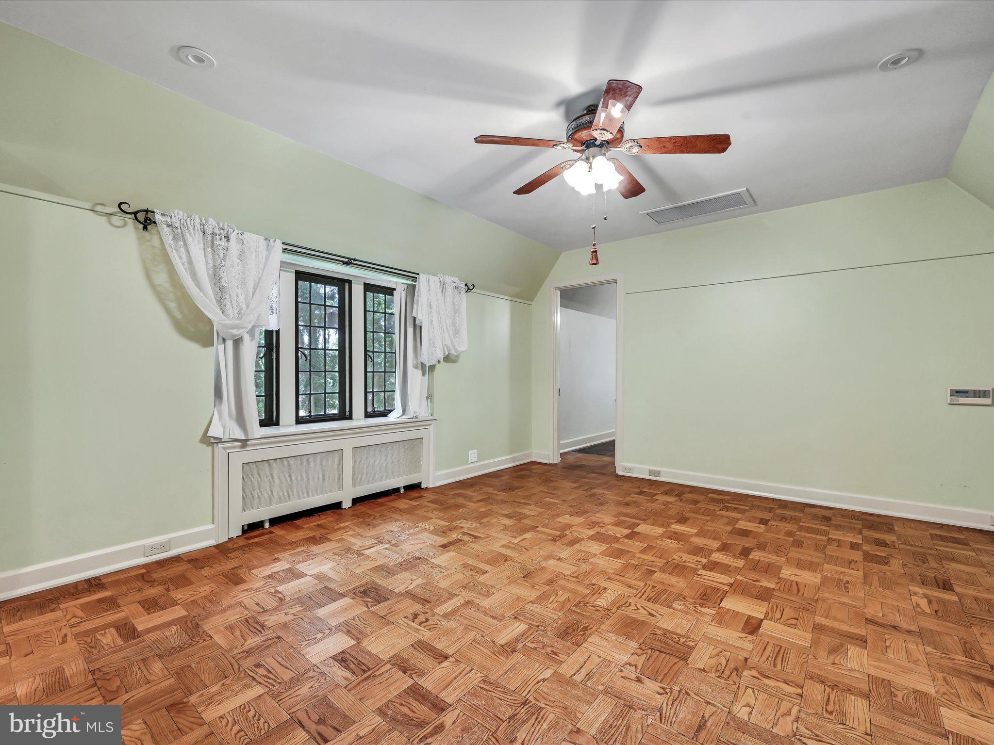 405 North Tulpehocken Road Reading, PA 19601 - Photo 26 of 111 a view of an empty room with window and chandelier fan