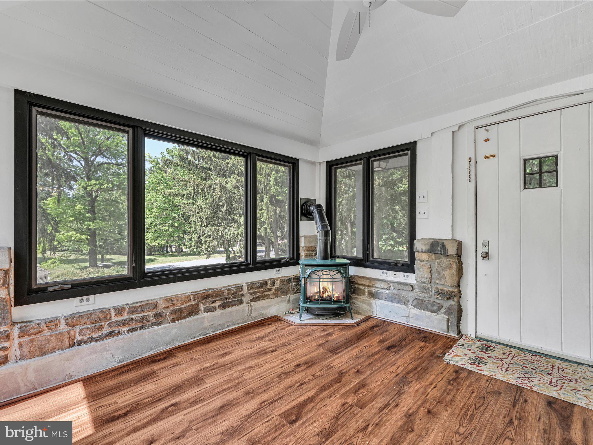 405 North Tulpehocken Road Reading, PA 19601 - Photo 50 of 111 a large white room with a large window and wooden floor