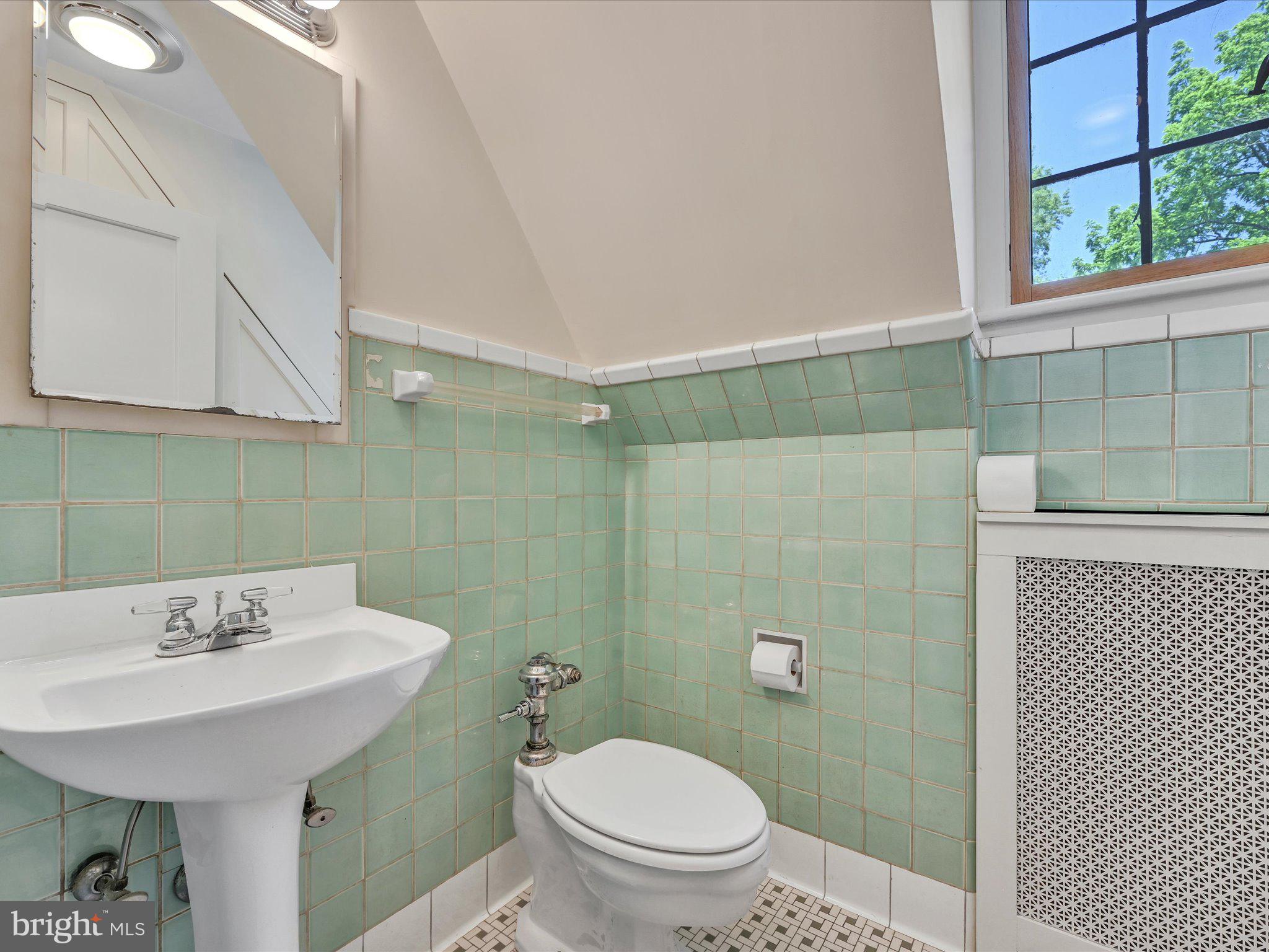 405 North Tulpehocken Road Reading, PA 19601 - Photo 58 of 111 a bathroom with a sink a toilet and mirror