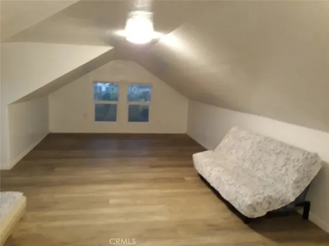 a view of staircase with white walls