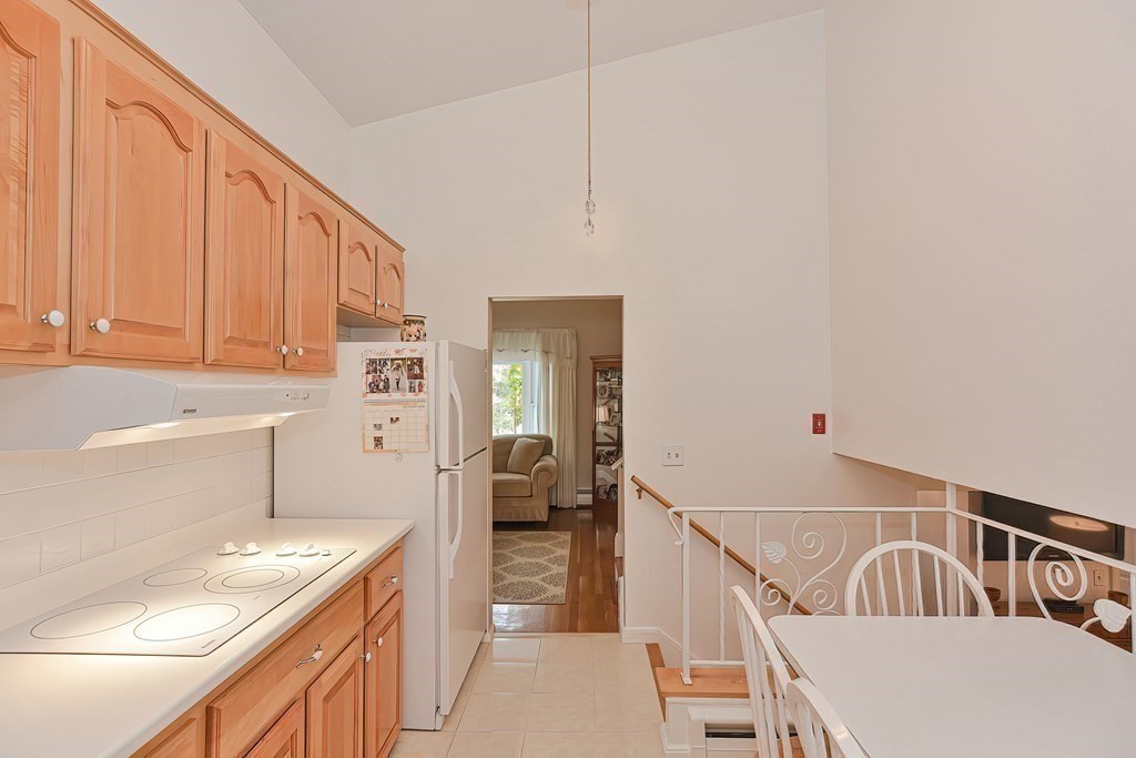 23 Edward Street Canton, MA 02021 - Photo 14 of 40 a kitchen with a sink a stove and cabinets