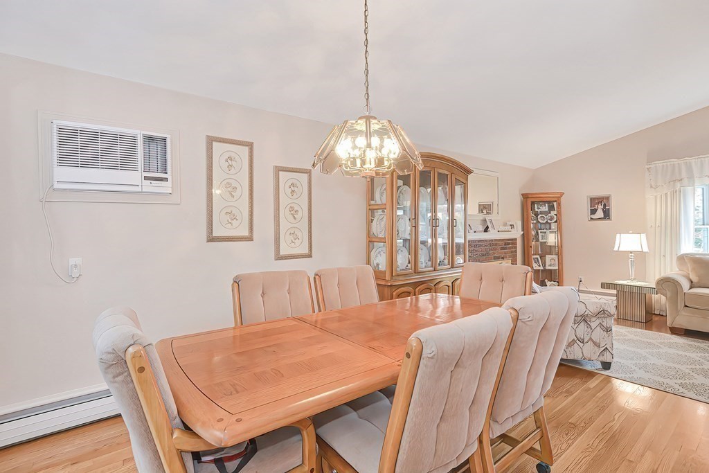 23 Edward Street Canton, MA 02021 - Photo 16 of 40 a view of a dining room with furniture and wooden floor