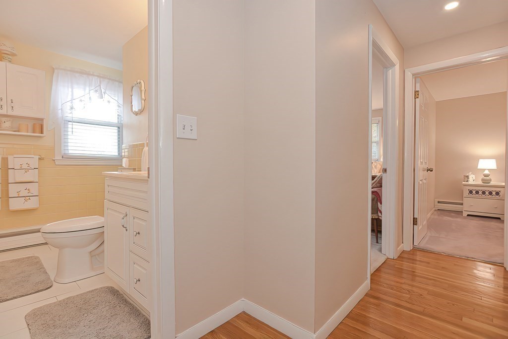23 Edward Street Canton, MA 02021 - Photo 22 of 40 a bathroom with a toilet sink and a mirror