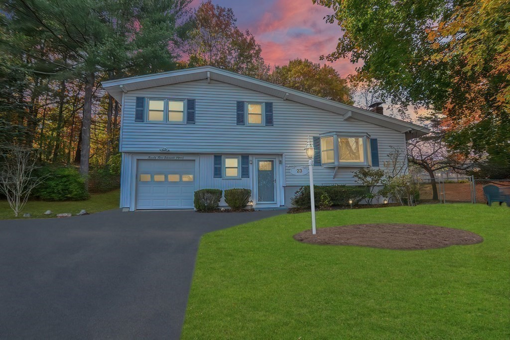 23 Edward Street Canton, MA 02021 - Photo 3 of 40 a view of a house with a yard