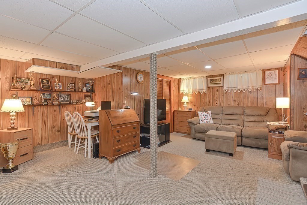23 Edward Street Canton, MA 02021 - Photo 31 of 40 a living room with furniture and a large window