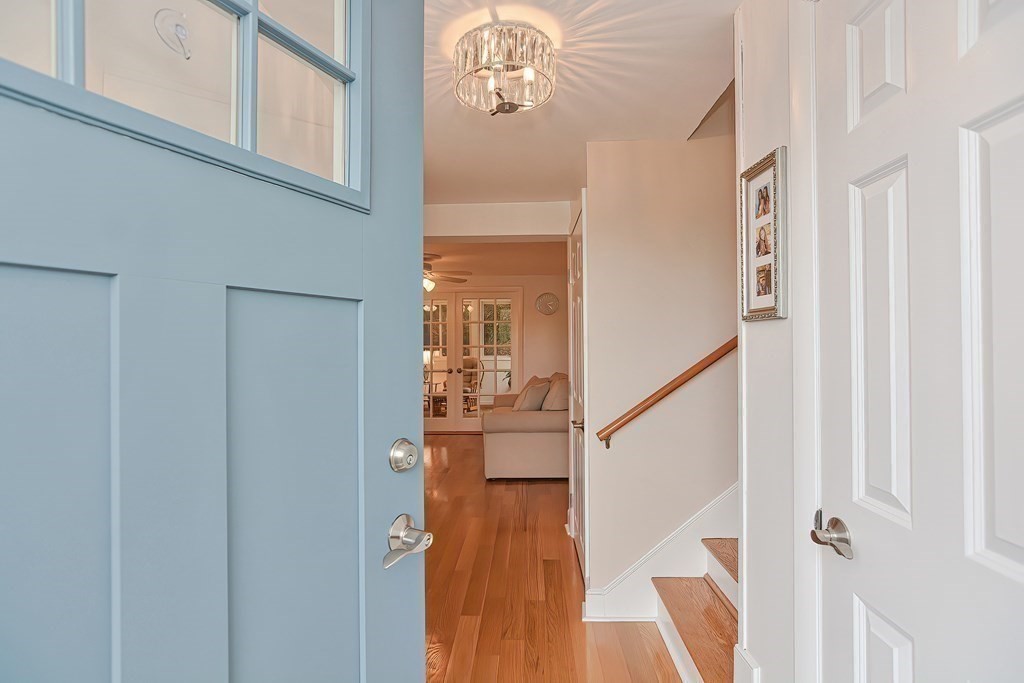 23 Edward Street Canton, MA 02021 - Photo 4 of 40 a view of entryway with wooden floor