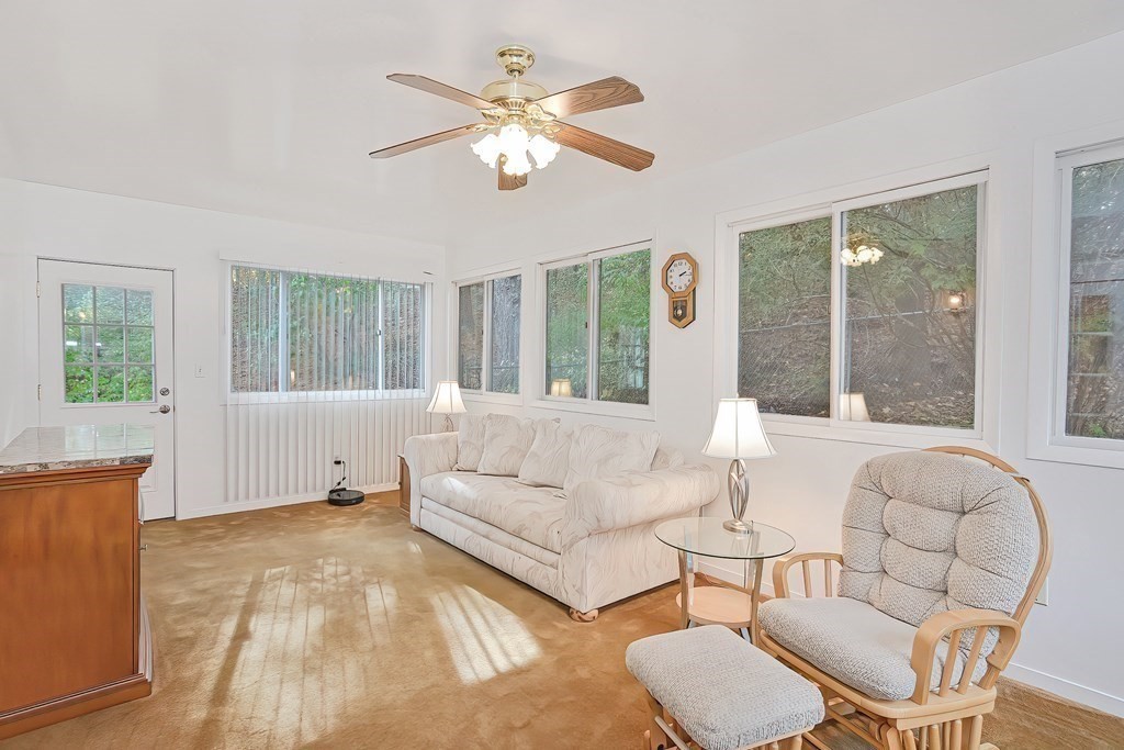 23 Edward Street Canton, MA 02021 - Photo 8 of 40 a living room with furniture and a large window