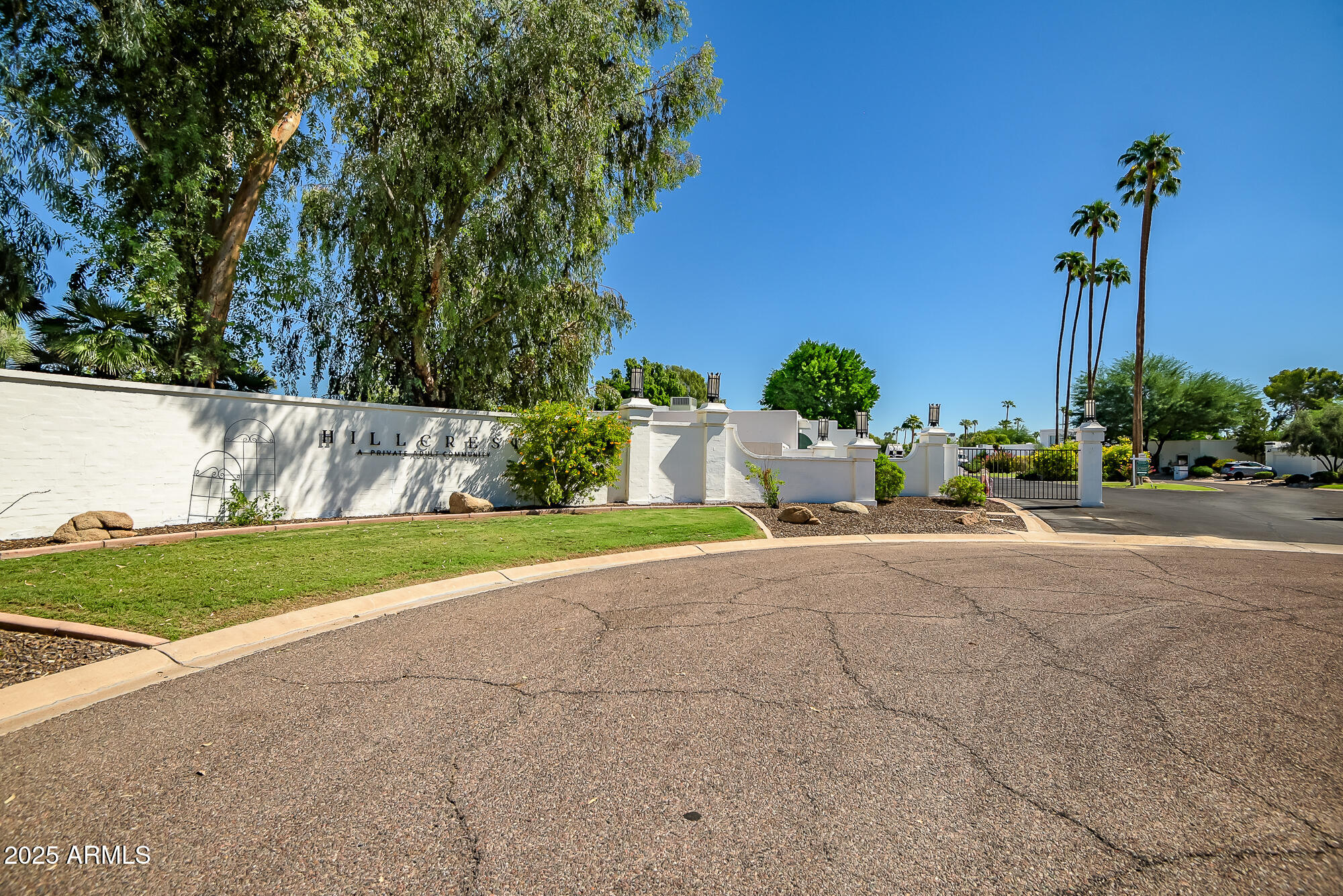 110 East Piping Rock Road Phoenix, AZ 85022 - Photo 35 of 37 a view of a garden with a bench