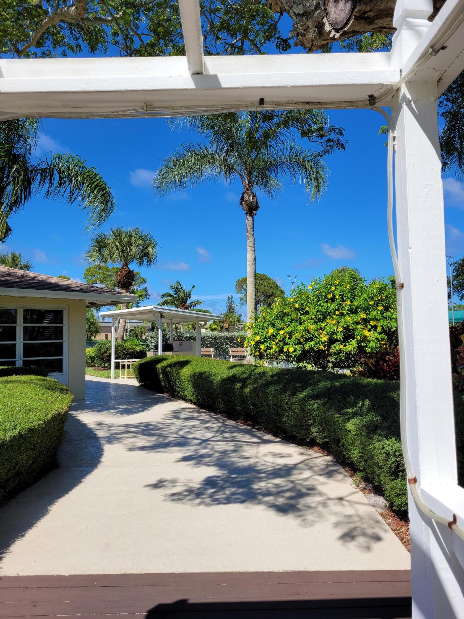 2950 Southeast Ocean Boulevard, Unit 1345 Stuart, FL 34996 - Photo 47 of 52 Walkway to Clubhouse