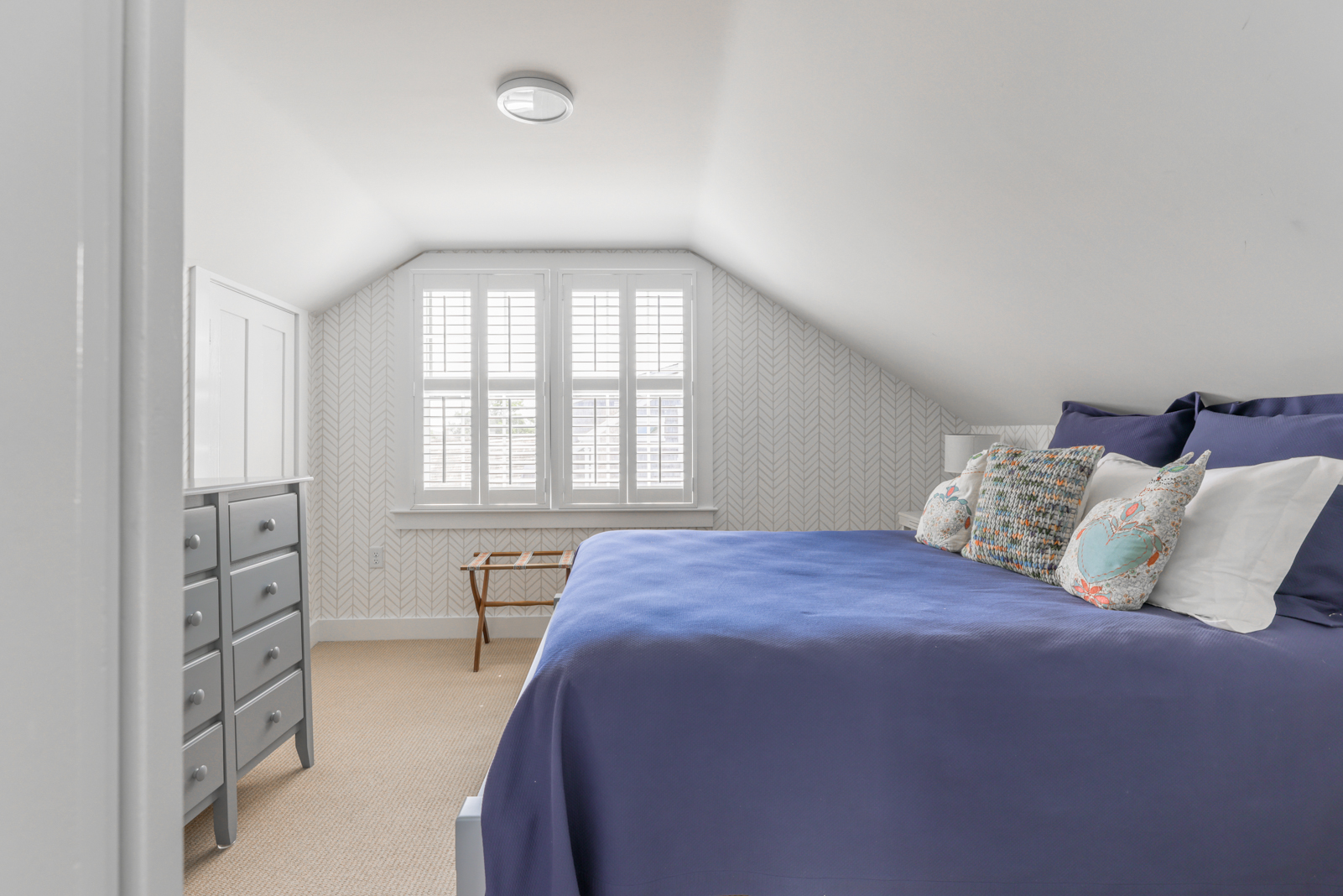 12 Hussey Street Nantucket, MA 02554 - Photo 31 of 47 a bedroom with a bed and a large window