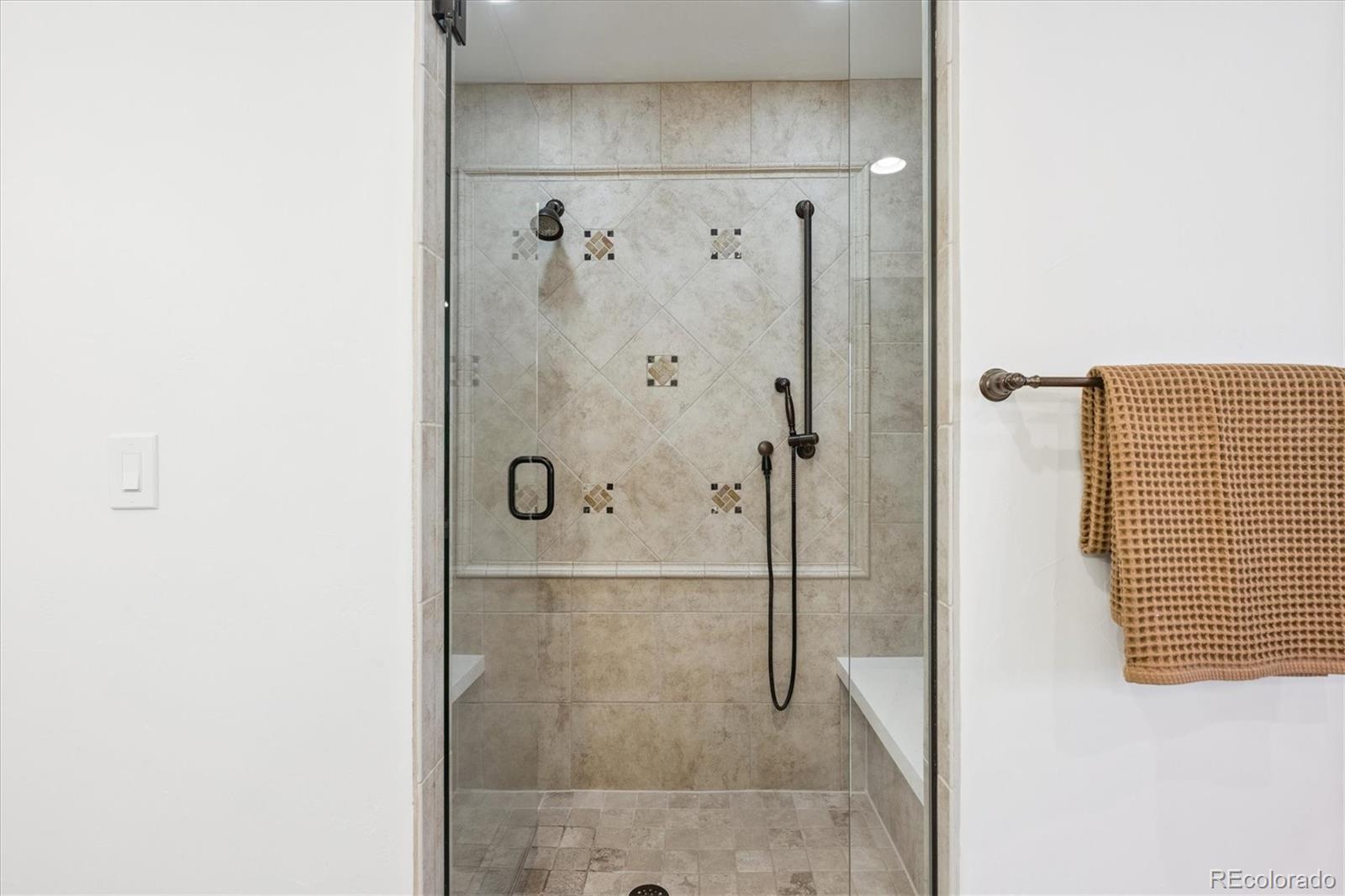 2415 South Madison Street Denver, CO 80210 - Photo 25 of 37 a bathroom with a shower