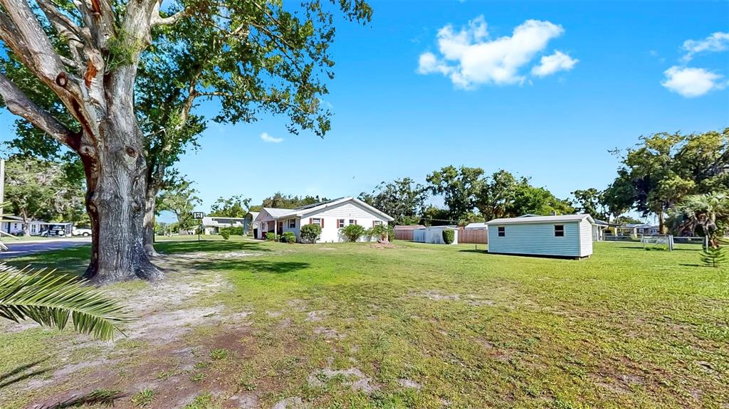 38919 3rd Avenue Zephyrhills, FL 33542 - Photo 26 of 36 a house view with a garden space