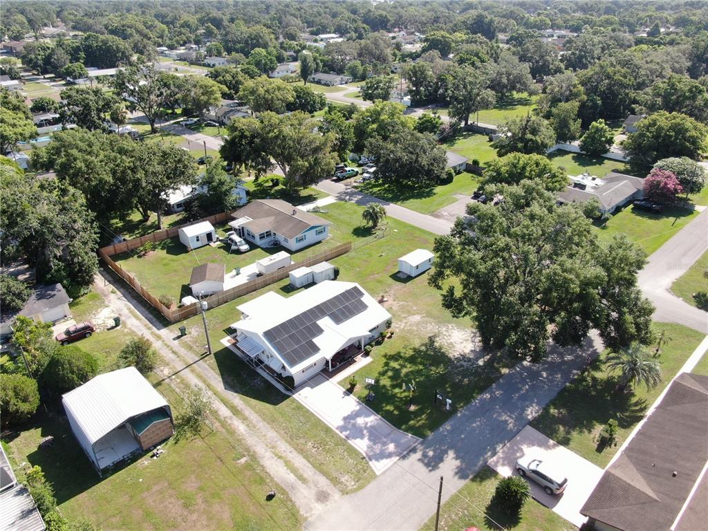38919 3rd Avenue Zephyrhills, FL 33542 - Photo 29 of 36 an aerial view of a house with a yard