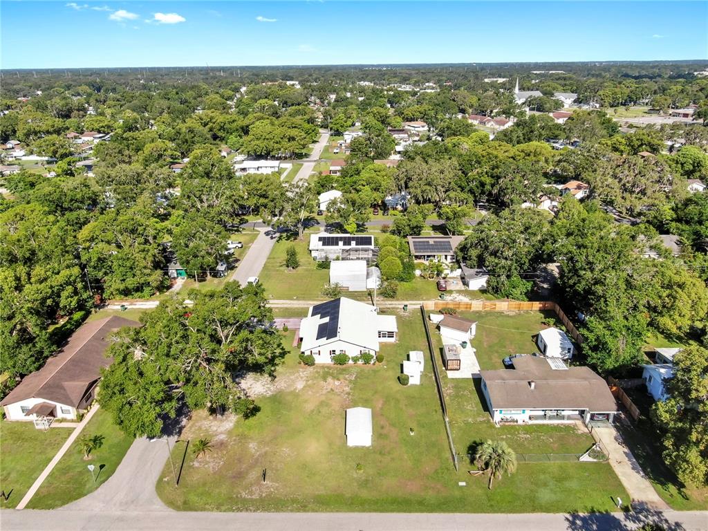 38919 3rd Avenue Zephyrhills, FL 33542 - Photo 30 of 36 an aerial view of residential houses with outdoor space