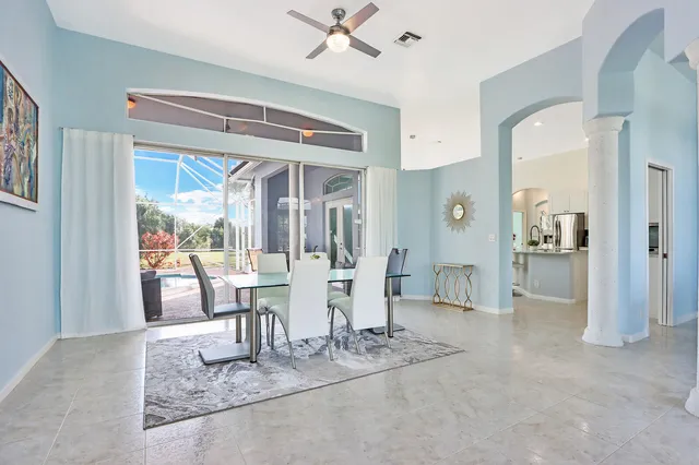 a living room with furniture and a table