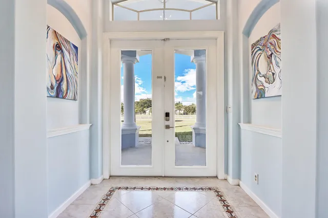 wooden floor with white walls