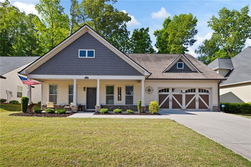 102 Kirk Drive Dallas, GA 30132 - Photo 1 of 28 a front view of a house with a yard