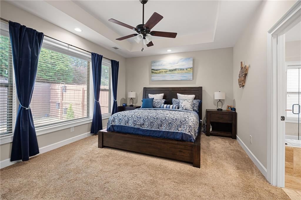 102 Kirk Drive Dallas, GA 30132 - Photo 14 of 28 a bedroom with a large bed and a large window