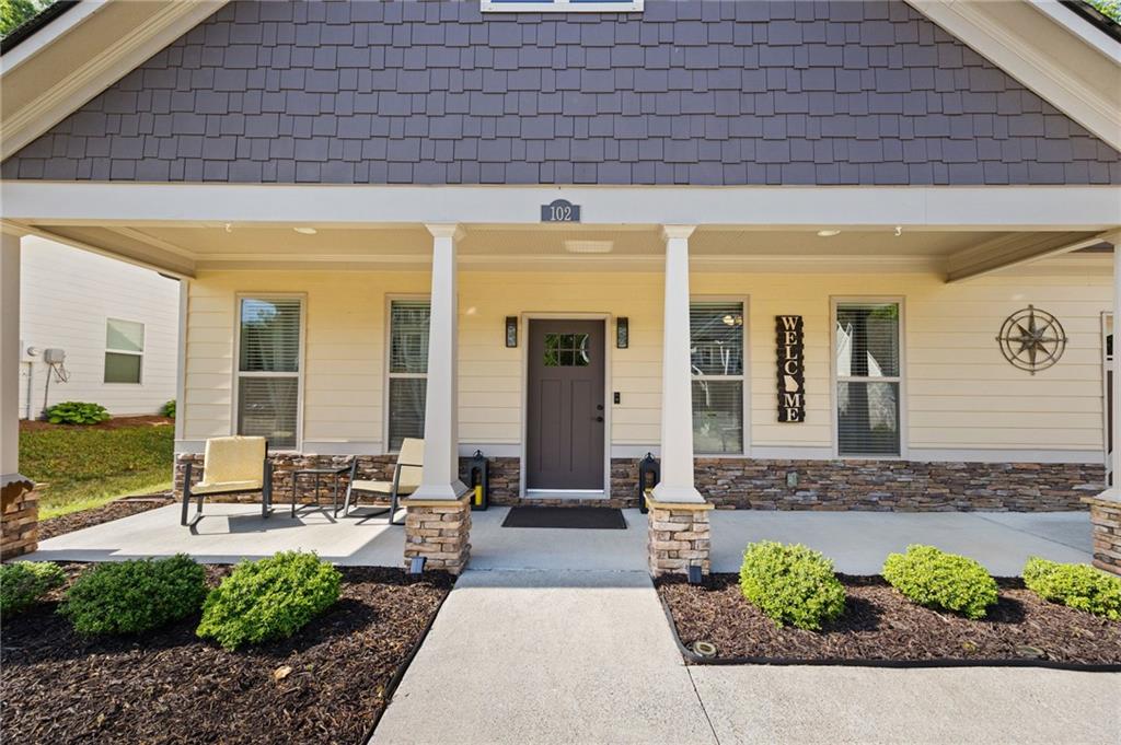 102 Kirk Drive Dallas, GA 30132 - Photo 2 of 28 a front view of a house with outdoor seating