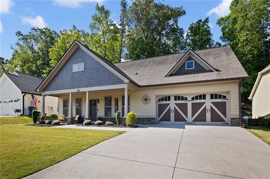102 Kirk Drive Dallas, GA 30132 - Photo 27 of 28 a front view of a house with garden