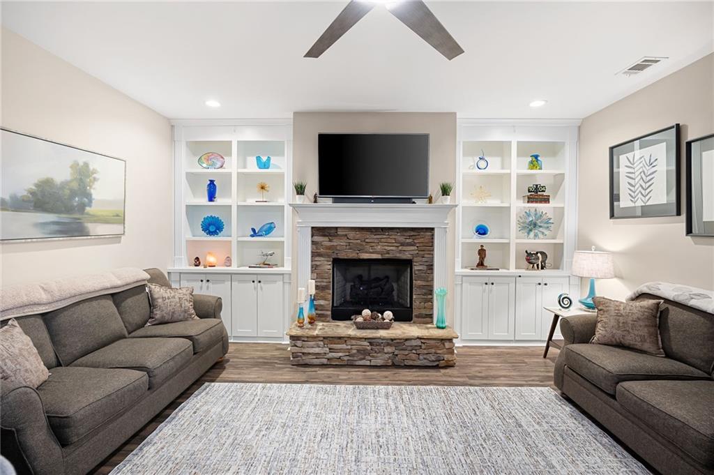 102 Kirk Drive Dallas, GA 30132 - Photo 5 of 28 a living room with furniture a flat screen tv and a fireplace