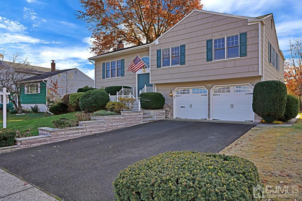 134 Benart Place Middlesex, NJ 08846 - Photo 1 of 28 a front view of a house with a yard