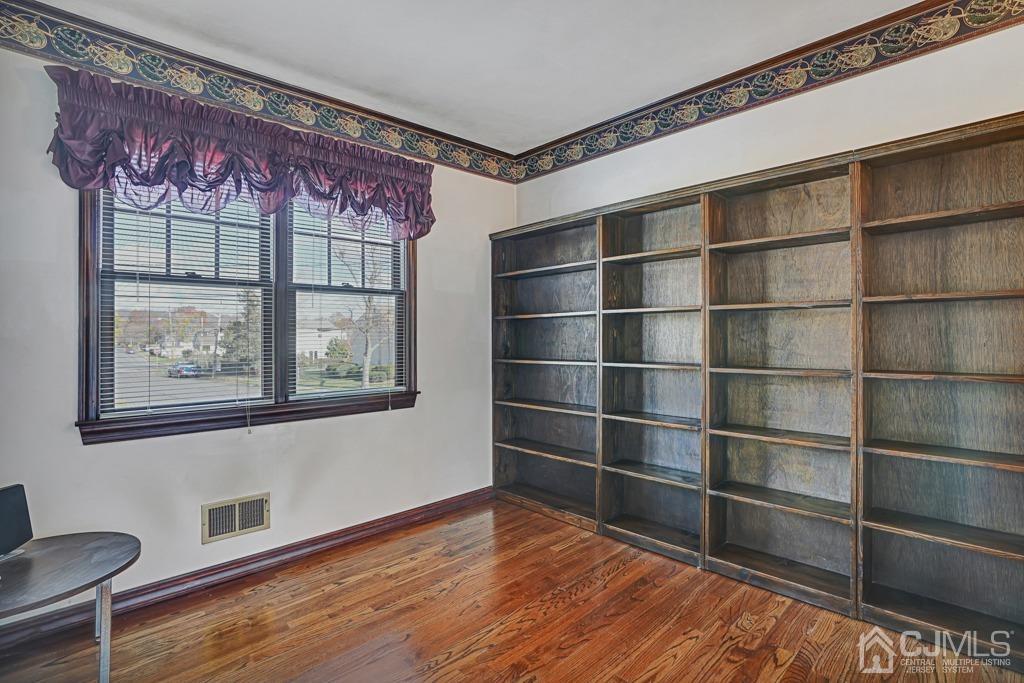 134 Benart Place Middlesex, NJ 08846 - Photo 17 of 28 a view of a room with wooden floor and a window