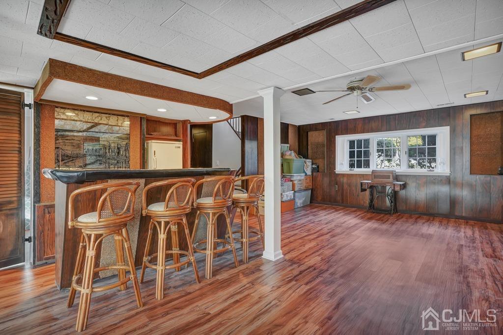 134 Benart Place Middlesex, NJ 08846 - Photo 20 of 28 a living room with furniture and a wooden floor