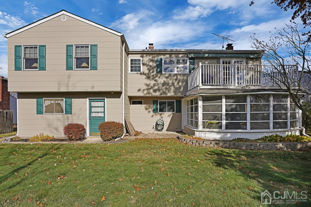 134 Benart Place Middlesex, NJ 08846 - Photo 28 of 28 a front view of a house with a yard