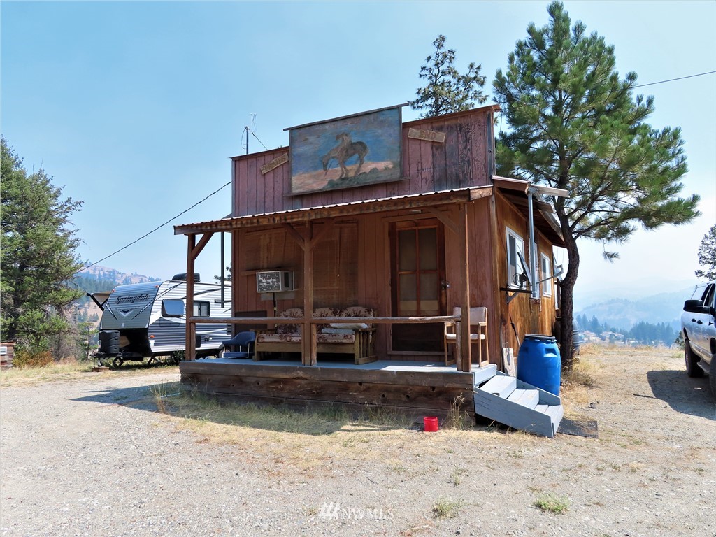 94 East Lilly Creek Road Republic, WA 99166 - Photo 1 of 20 a view of building with outdoor space