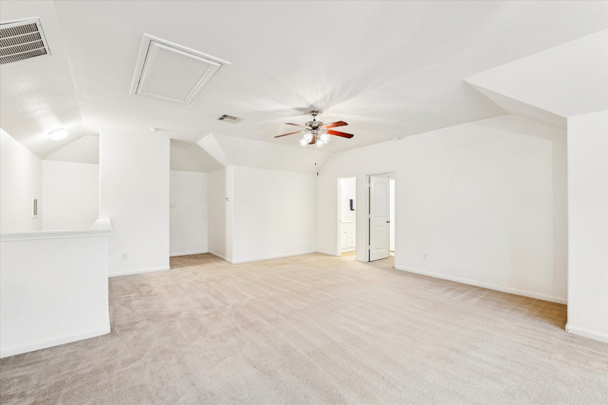 191 Maple Grove Drive Conroe, TX 77384 - Photo 18 of 27 A secondary view of the upstairs game room.