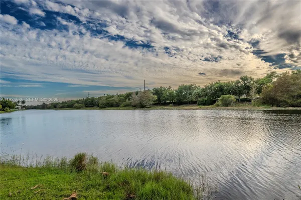 a view of a lake from a yard