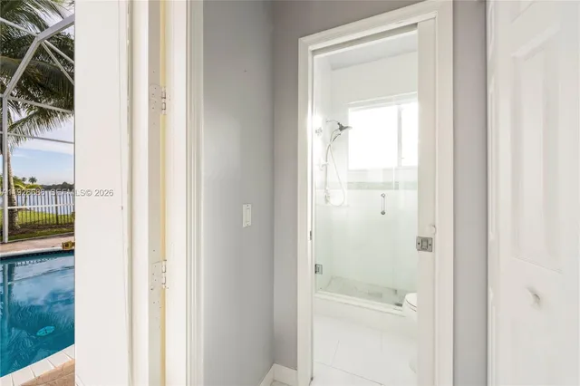 a bathroom with a sink and a large mirror