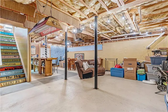 a backyard of a house with outdoor seating