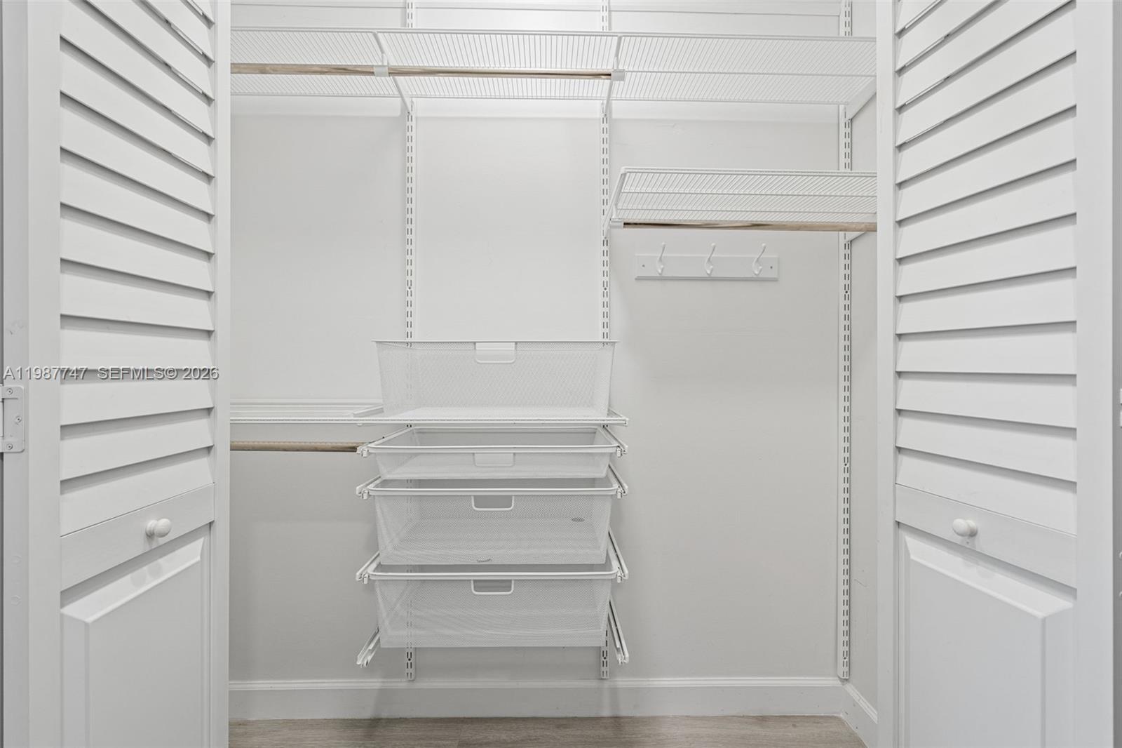 7765 Southwest 86th Street, Unit F2303 Miami, FL 33143 - Photo 22 of 50 a view of walk in closet