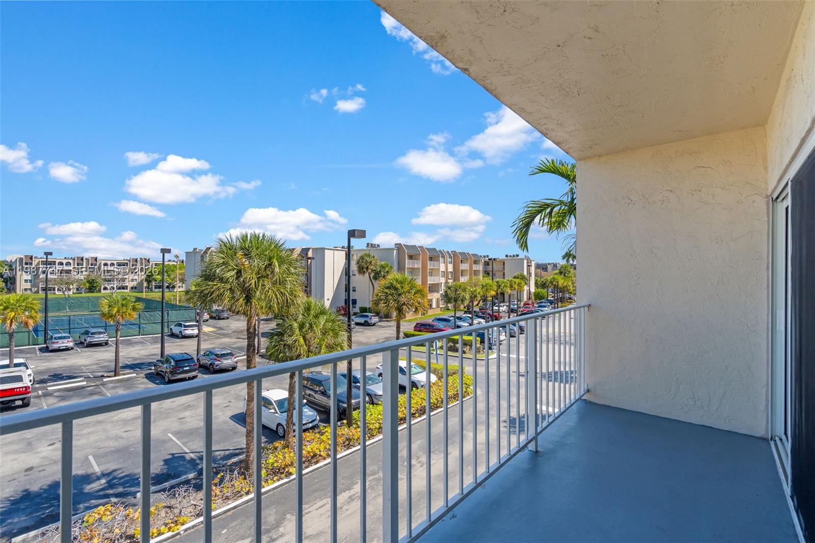 7765 Southwest 86th Street, Unit F2303 Miami, FL 33143 - Photo 33 of 50 a view of a balcony