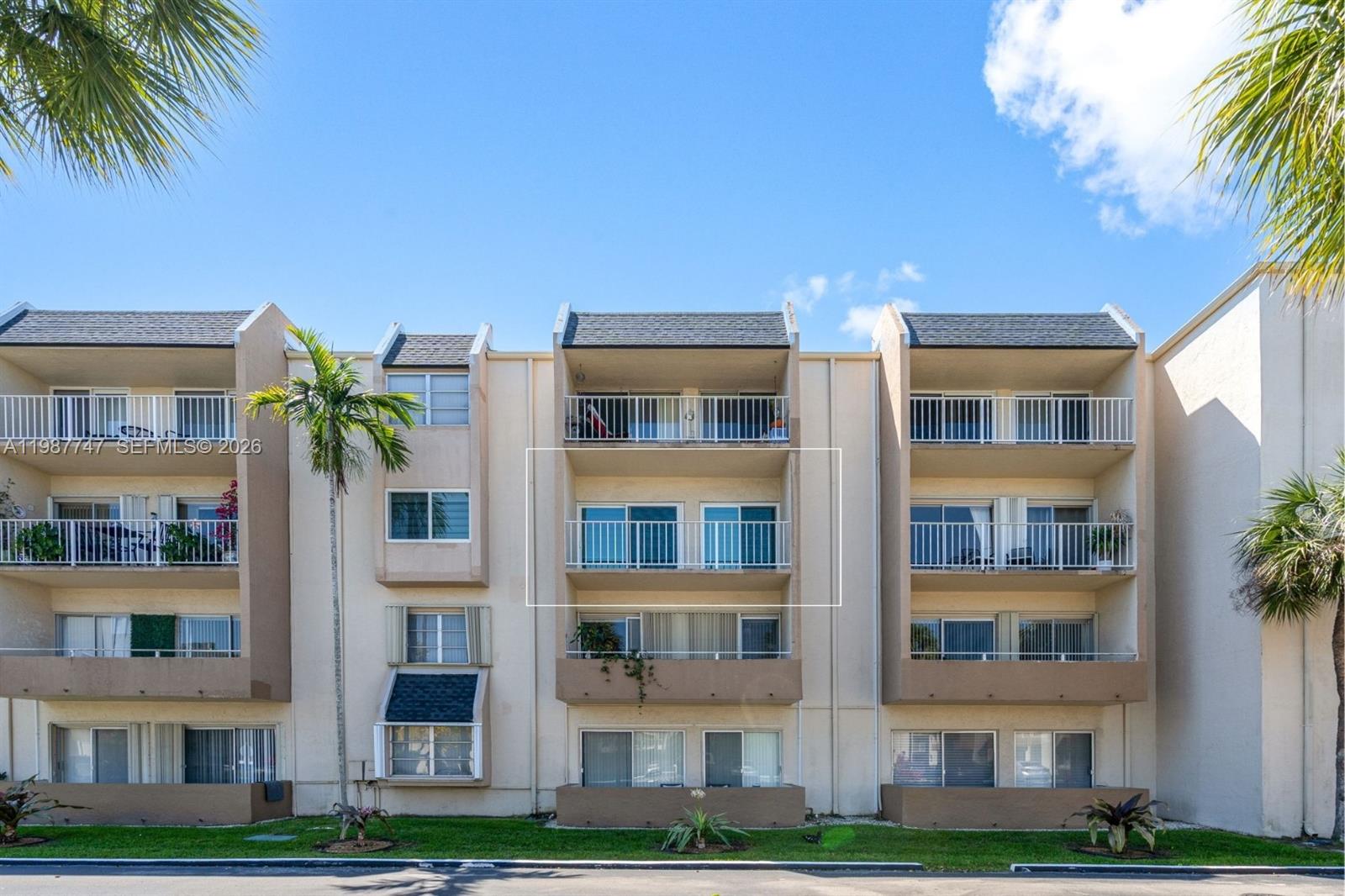 7765 Southwest 86th Street, Unit F2303 Miami, FL 33143 - Photo 35 of 50 a front view of a multi story building