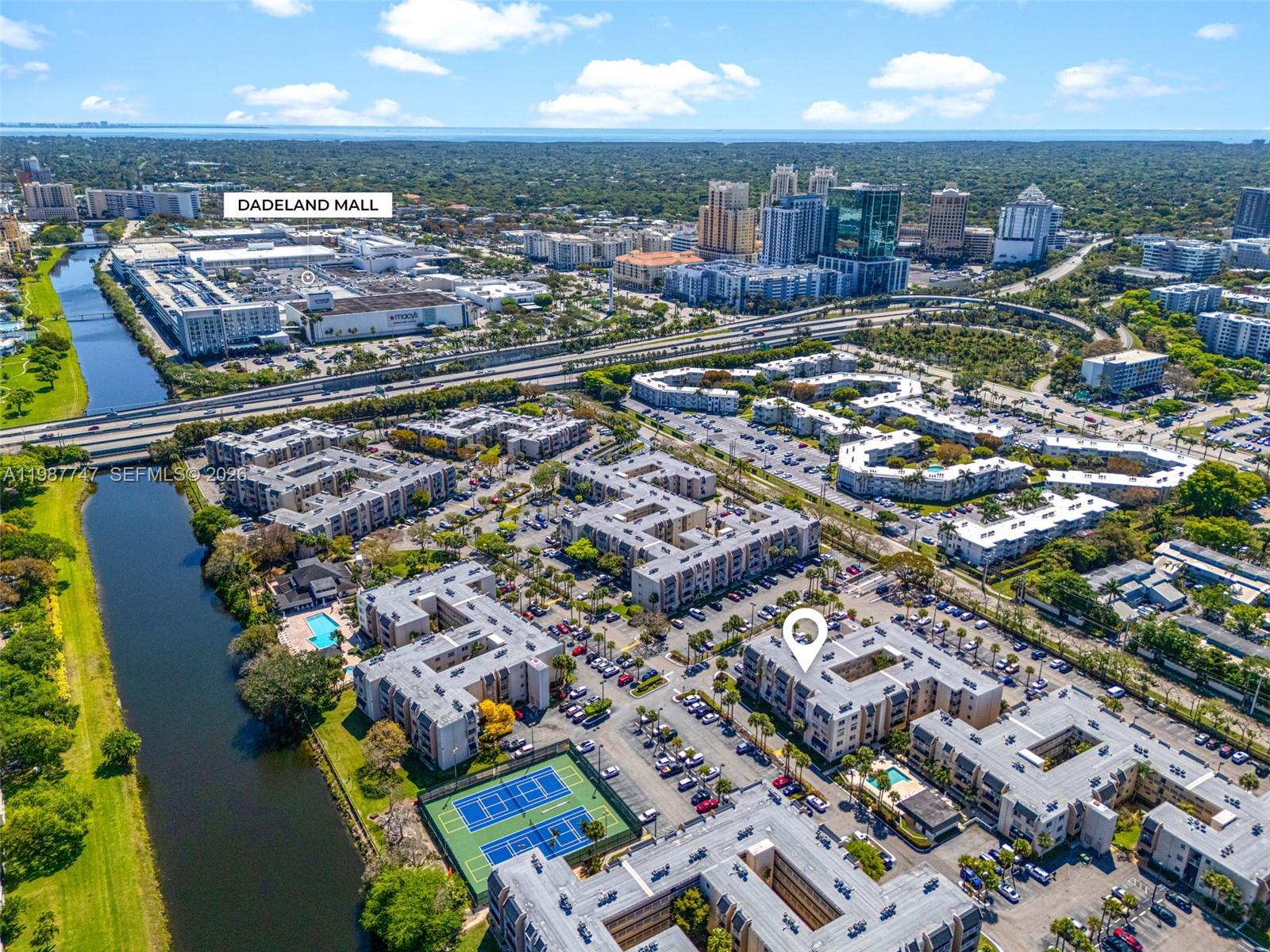 7765 Southwest 86th Street, Unit F2303 Miami, FL 33143 - Photo 48 of 50 an aerial view of residential houses with outdoor space